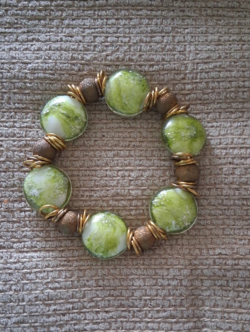 Green Marble Glass Bead Stretch Bracelet with Gold Accents